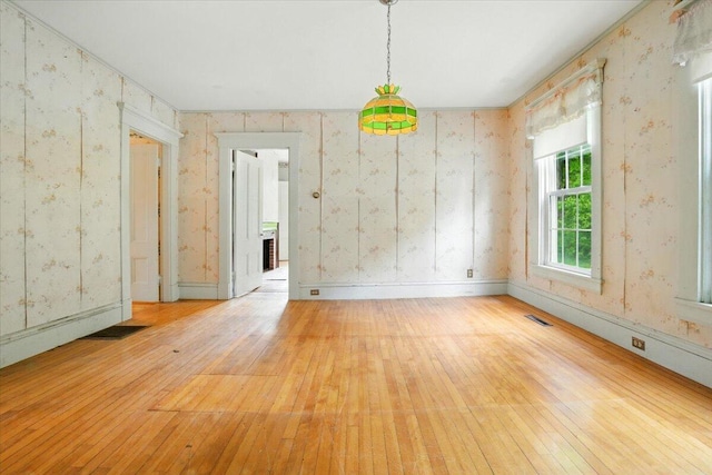 1835 Main St, Fayette, ME 04349 - unfurnished room with light wood-style flooring and wallpapered walls