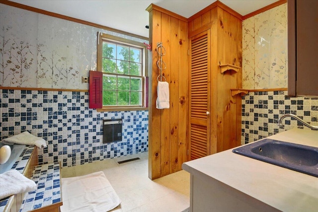 1835 Main St, Fayette, ME 04349 - bathroom with crown molding, vanity, wainscoting, and wallpapered walls