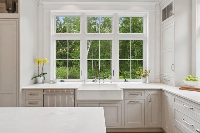 38 Fieldstone Ln, Falmouth, ME 04105 - kitchen featuring stainless steel dishwasher, crown molding, light stone counters, and plenty of natural light
