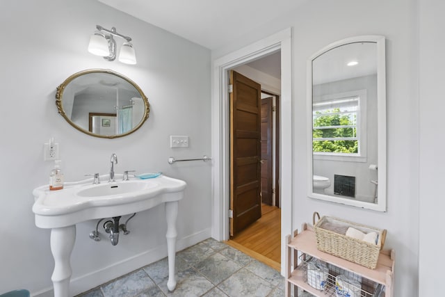 4 Hamlin Pl, York, ME 03909 - bathroom with baseboards and stone finish floors