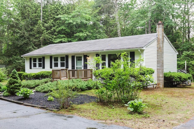 70 Whitten Rd, Kennebunk, ME 04043 - ranch-style home with covered porch and a chimney