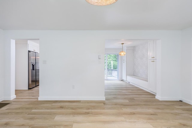 70 Whitten Rd, Kennebunk, ME 04043 - empty room featuring light wood finished floors and baseboards