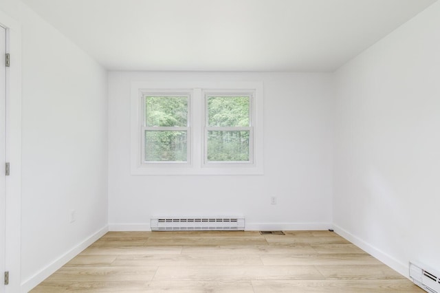 70 Whitten Rd, Kennebunk, ME 04043 - spare room featuring baseboard heating and light wood-style floors
