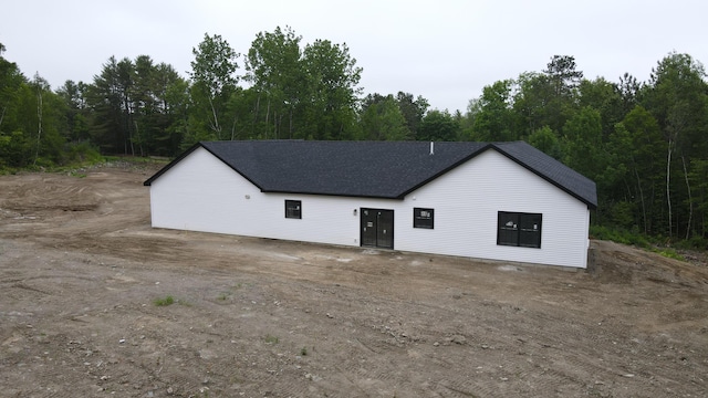 316 Clark Rd, Hermon, ME 04401 - garage with a view of trees