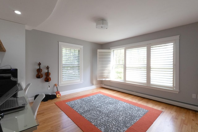 7 Hamlin St, Cape Elizabeth, ME 04107 - home office featuring baseboard heating, wood finished floors, and recessed lighting