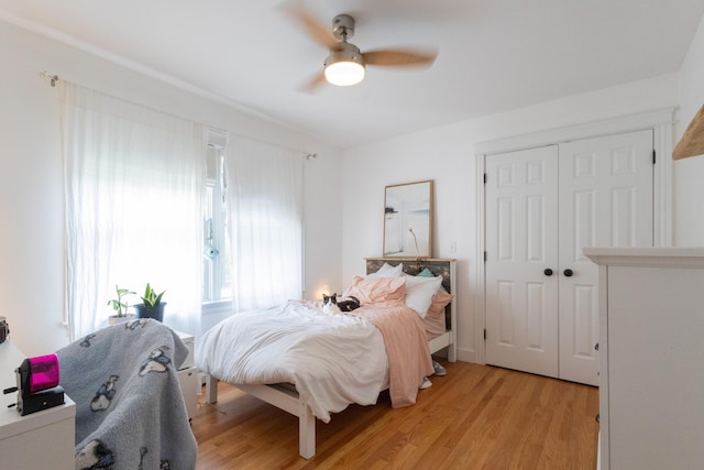7 Hamlin St, Cape Elizabeth, ME 04107 - bedroom with light wood-style flooring, a closet, and a ceiling fan