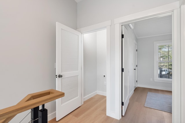 14 Salt Point Dr Unit 19, Old Orchard Beach, ME 04064 - hall featuring light wood-style flooring, baseboards, and crown molding