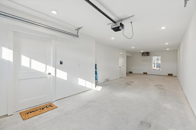 14 Salt Point Dr Unit 19, Old Orchard Beach, ME 04064 - garage with a garage door opener and recessed lighting