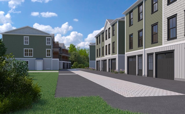 14 Salt Point Dr Unit 19, Old Orchard Beach, ME 04064 - view of community with driveway and a garage