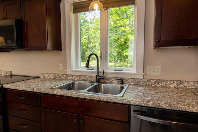 33 Webb Rd, Windham, ME 04062 - kitchen with appliances with stainless steel finishes, dark brown cabinets, and light countertops