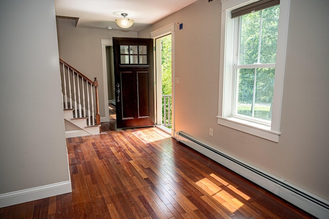 33 Webb Rd, Windham, ME 04062 - foyer entrance featuring baseboard heating, hardwood / wood-style floors, and stairs