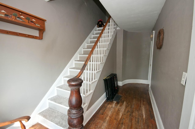 198 3rd St, Bangor, ME 04401 - staircase featuring wood finished floors