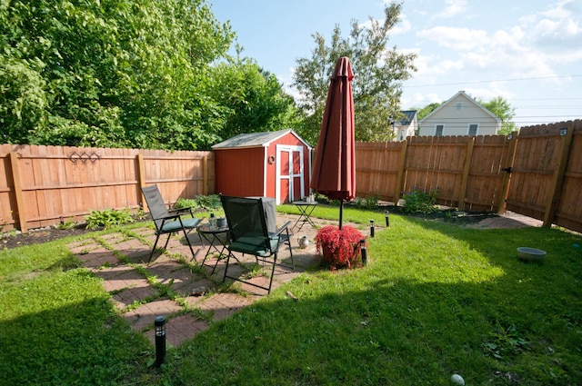 198 3rd St, Bangor, ME 04401 - fenced backyard featuring a storage shed