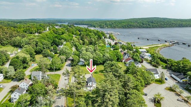 166 Franklin St, Bucksport, ME 04416 - aerial view of property and surrounding area featuring a forest and a large body of water