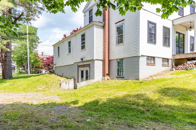 166 Franklin St, Bucksport, ME 04416 - back of house with a yard