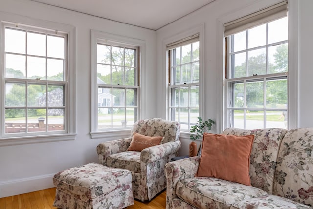 166 Franklin St, Bucksport, ME 04416 - living area with healthy amount of natural light and light wood finished floors