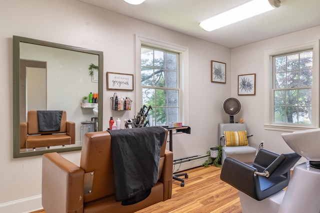166 Franklin St, Bucksport, ME 04416 - office space with a baseboard radiator and light wood finished floors