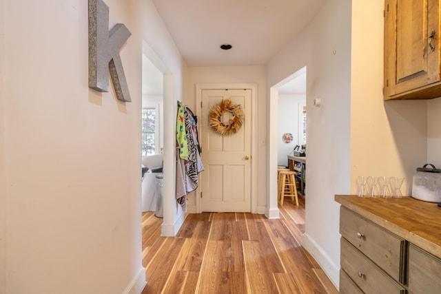 166 Franklin St, Bucksport, ME 04416 - hallway featuring light wood finished floors and baseboards