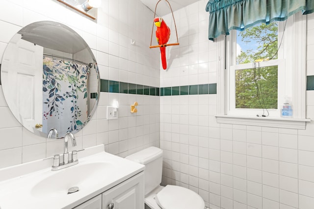 48 E Pasture Rd, Berwick, ME 03901 - bathroom with tile walls, vanity, toilet, a shower with shower curtain, and backsplash