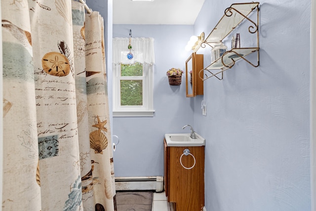 48 E Pasture Rd, Berwick, ME 03901 - bathroom featuring a baseboard radiator, vanity, and curtained shower