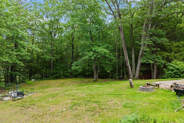 48 E Pasture Rd, Berwick, ME 03901 - view of grassy yard featuring an outdoor fire pit