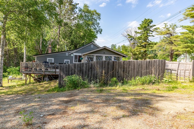 194 Main Rd, Passadumkeag, ME 04475 - view of home's exterior with a chimney and a deck