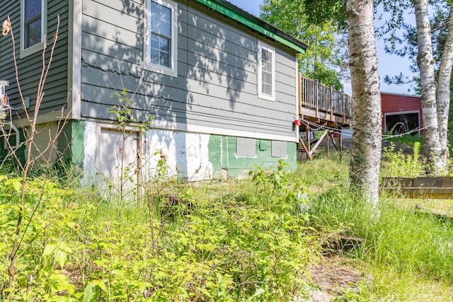194 Main Rd, Passadumkeag, ME 04475 - view of side of home featuring a deck