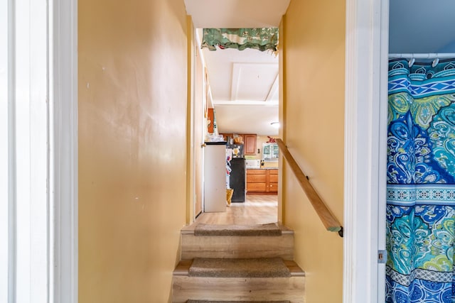 194 Main Rd, Passadumkeag, ME 04475 - stairs featuring wood finished floors