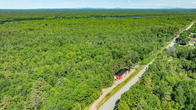 194 Main Rd, Passadumkeag, ME 04475 - aerial overview of property's location with a forest and mountains