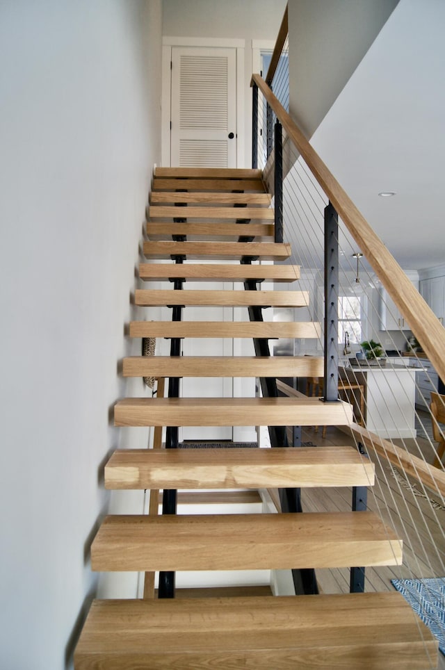 24 Salt Point Dr Unit 24, Old Orchard Beach, ME 04064 - stairs with wood finished floors
