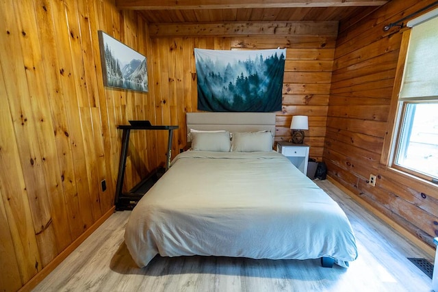1103 Rte 135, Monmouth, ME 04259 - bedroom with wood ceiling, wood walls, and wood finished floors