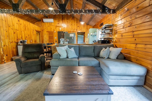 1103 Rte 135, Monmouth, ME 04259 - living room with a wooden ceiling with exposed beams, wood walls, wood finished floors, and high vaulted ceiling