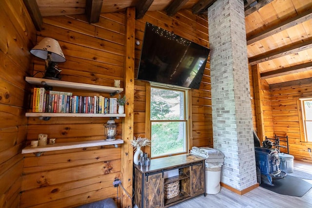 1103 Rte 135, Monmouth, ME 04259 - bedroom with wooden ceiling, wood walls, wood finished floors, and ornate columns