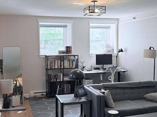 245 Broadway Unit 106, South Portland, ME 04106 - office area with a baseboard radiator and wood finished floors