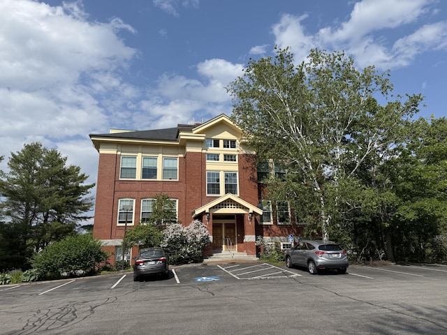 245 Broadway Unit 106, South Portland, ME 04106 - view of building exterior with uncovered parking