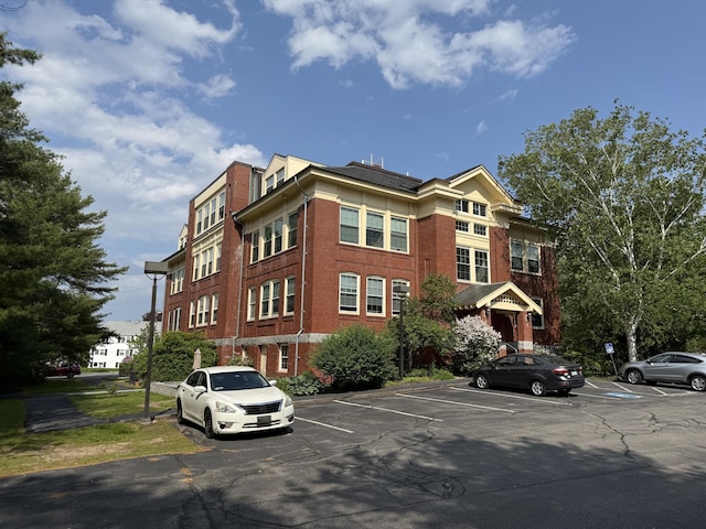 245 Broadway Unit 106, South Portland, ME 04106 - view of building exterior featuring uncovered parking