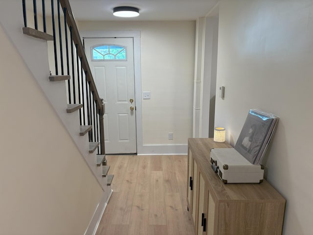10 Valley St, Augusta, ME 04330 - entryway with light wood-style flooring, stairway, and baseboards