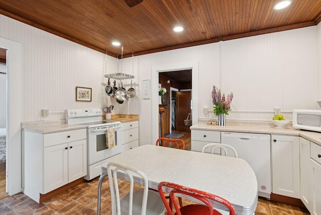134 W Grand Ave, Old Orchard Beach, ME 04064 - kitchen with white appliances, wood ceiling, ornamental molding, white cabinetry, and light countertops