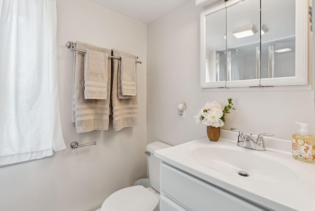 134 W Grand Ave, Old Orchard Beach, ME 04064 - bathroom featuring vanity and toilet