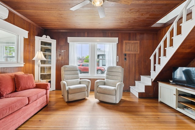 134 W Grand Ave, Old Orchard Beach, ME 04064 - living area featuring wooden ceiling, a ceiling fan, stairs, wooden walls, and wood finished floors