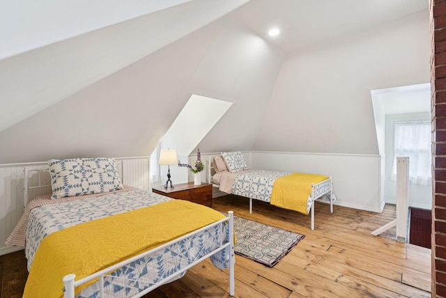 134 W Grand Ave, Old Orchard Beach, ME 04064 - bedroom with vaulted ceiling, hardwood / wood-style floors, wainscoting, and recessed lighting