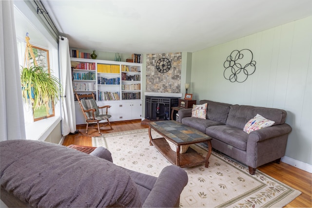 188 Old Chadbourne Rd, Lewiston, ME 04240 - living area with wood finished floors and a large fireplace