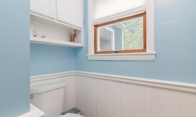 188 Old Chadbourne Rd, Lewiston, ME 04240 - half bathroom featuring wainscoting and toilet