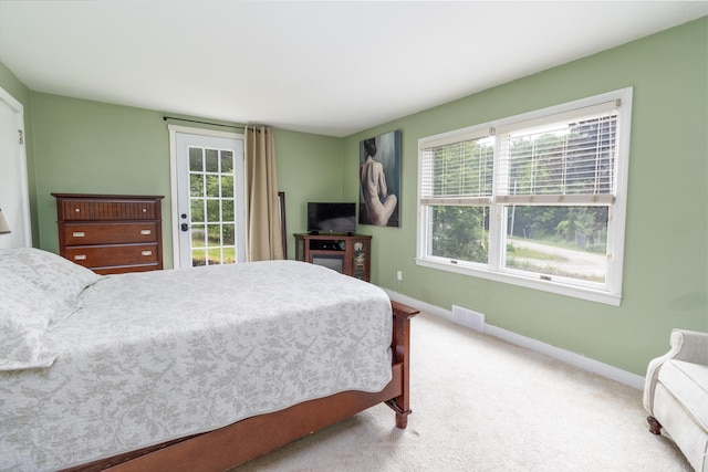 188 Old Chadbourne Rd, Lewiston, ME 04240 - carpeted bedroom featuring baseboards and access to exterior