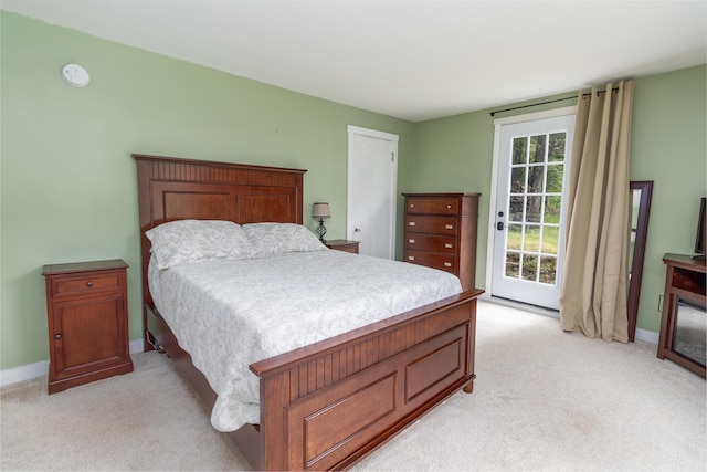 188 Old Chadbourne Rd, Lewiston, ME 04240 - bedroom featuring light carpet, access to exterior, and baseboards