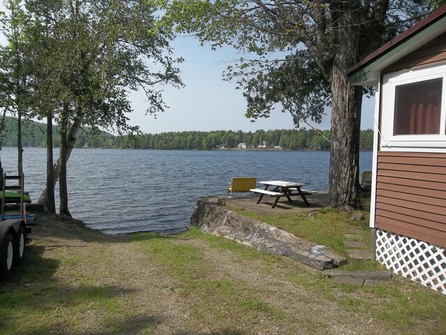 41 Hickory Ln, Alexander, ME 04694 - dock area featuring a water view and a view of trees