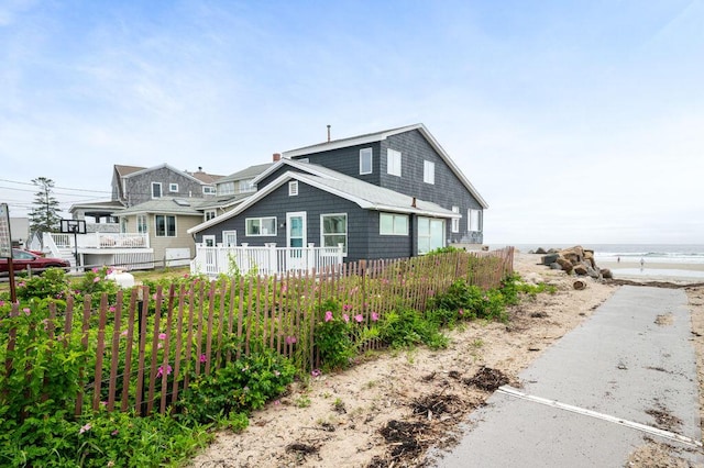 511 Ocean Ave, Wells, ME 04090 - view of side of home featuring view of water and beach