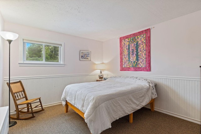 535 Spring St, Westbrook, ME 04092 - carpeted bedroom featuring wainscoting