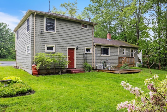 535 Spring St, Westbrook, ME 04092 - rear view of house with a wooden deck, a chimney, a lawn, and entry steps