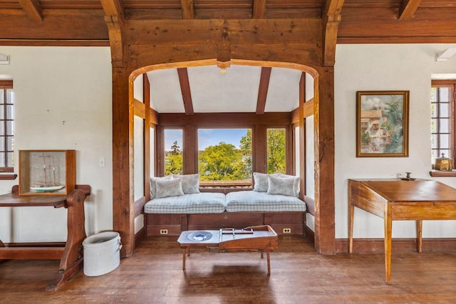 1392 N Haven Rd, Vinalhaven, ME 04863 - living area with hardwood / wood-style floors, arched walkways, and a wooden ceiling with exposed beams